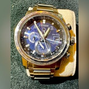 Citizens World Controlled Time Eco-Drive watch. Blue face